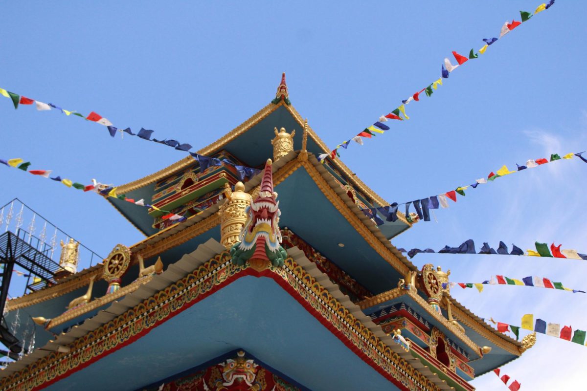 Close up Image of the Gue monastery design and prayer flags.